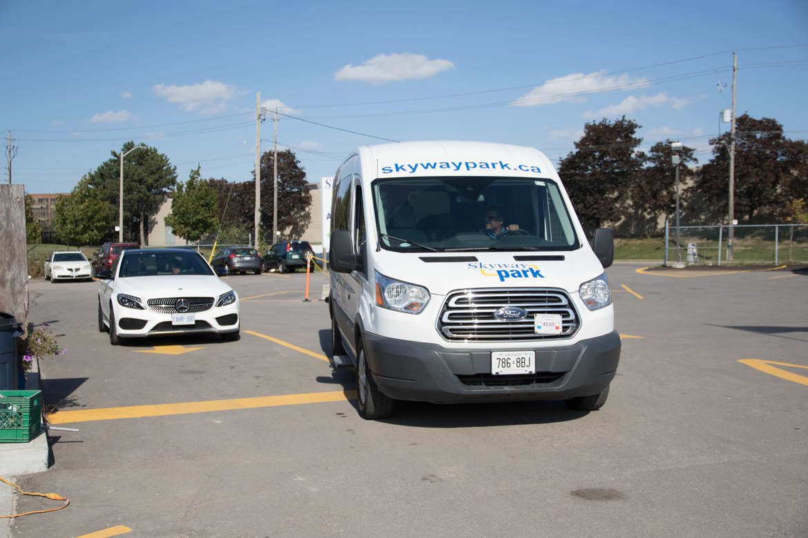 Skyway Park Shuttle escorting Vehicle
